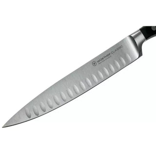 Wusthof Classic carving knife with hollow edge 23 cm. black Buy now on Shopdecor